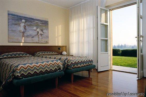 Le Robinie Golf & Resort سولْبياتي أولونا الغرفة الصورة